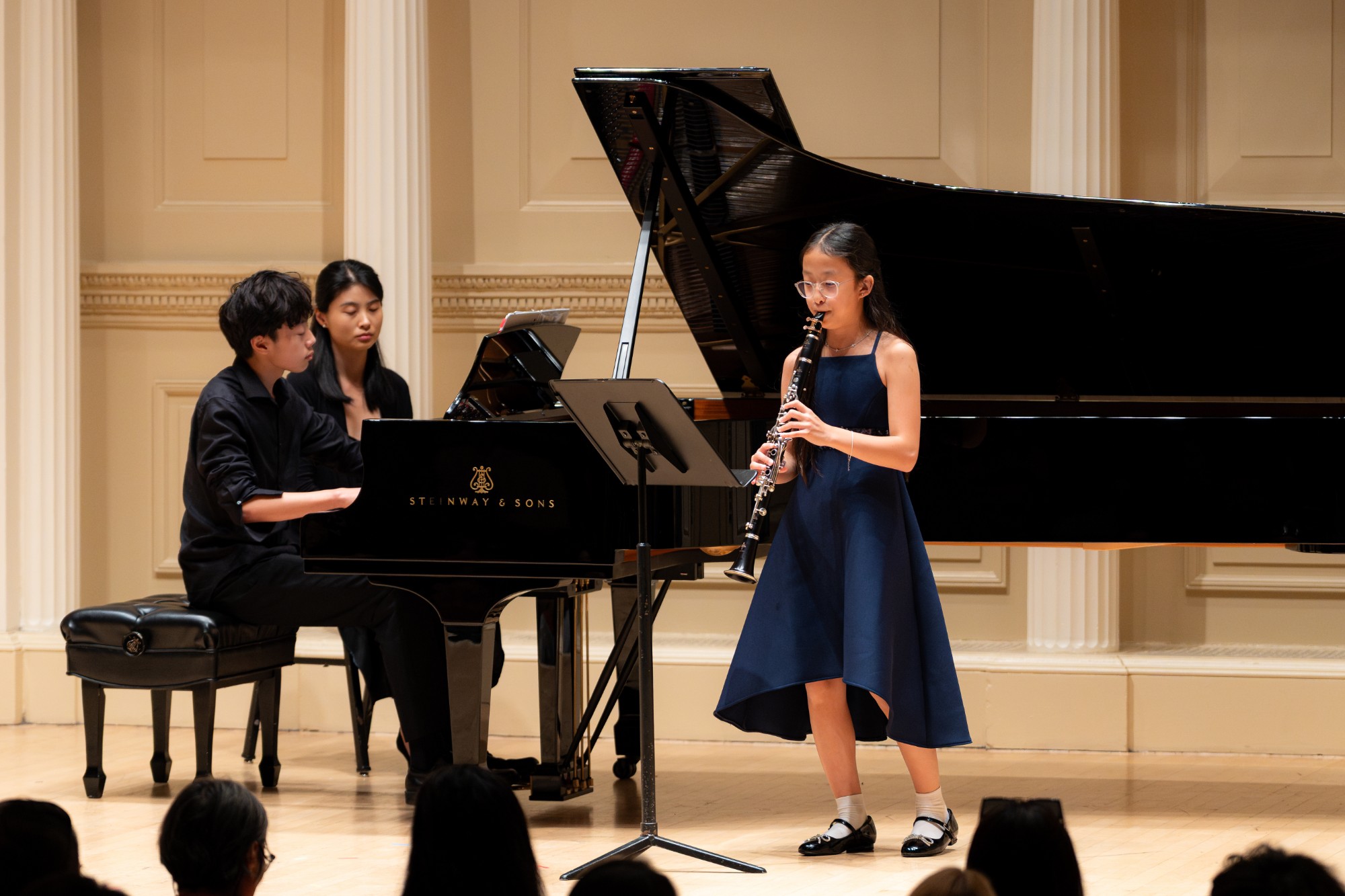 A young clarinetist performs with a pianist at Weill Recital Hall