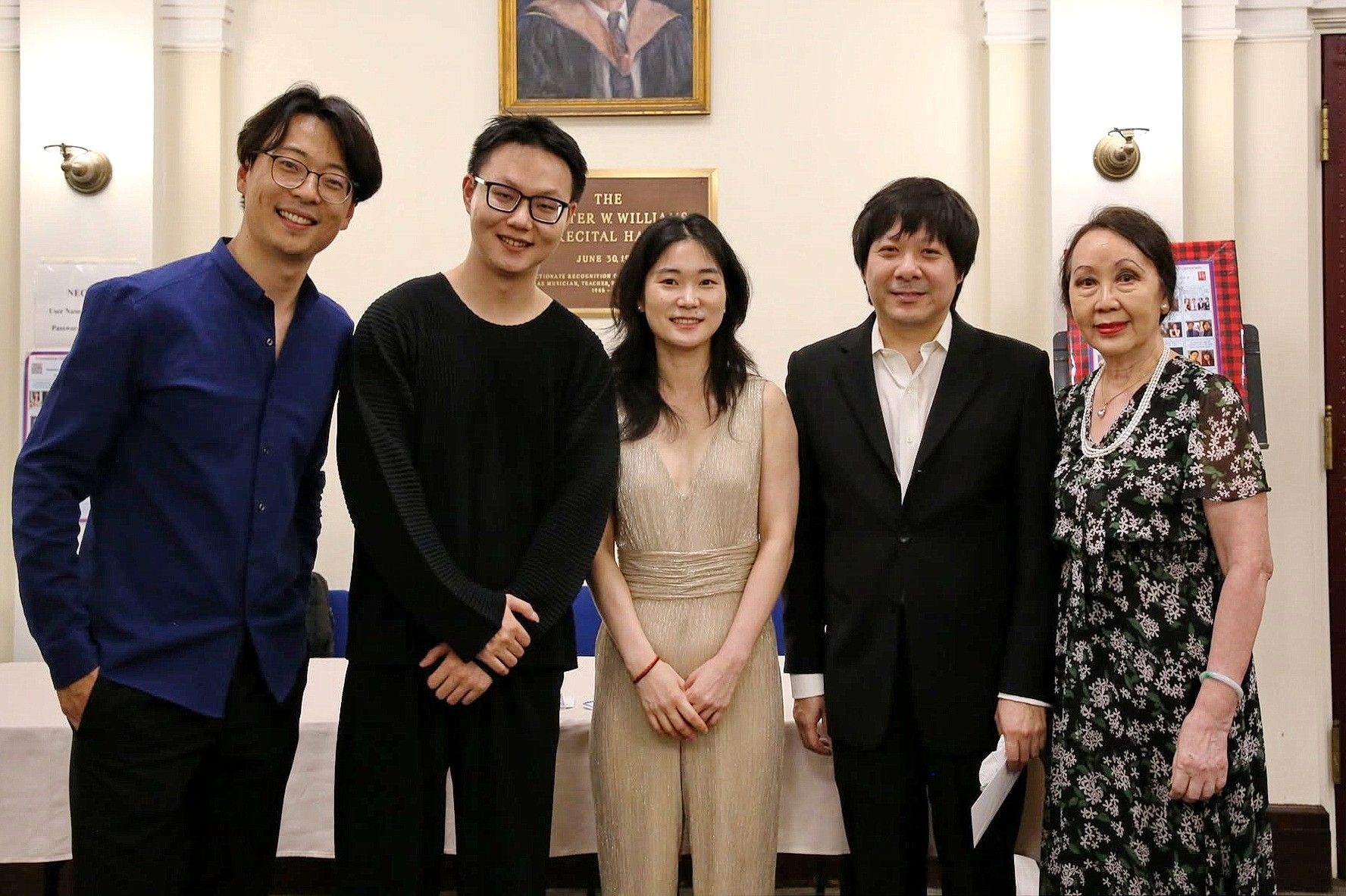 Mo Mo, Junhong Kuang, Qianwen Shen, and Yinfei Wang with a guest after the concert at Williams Hall