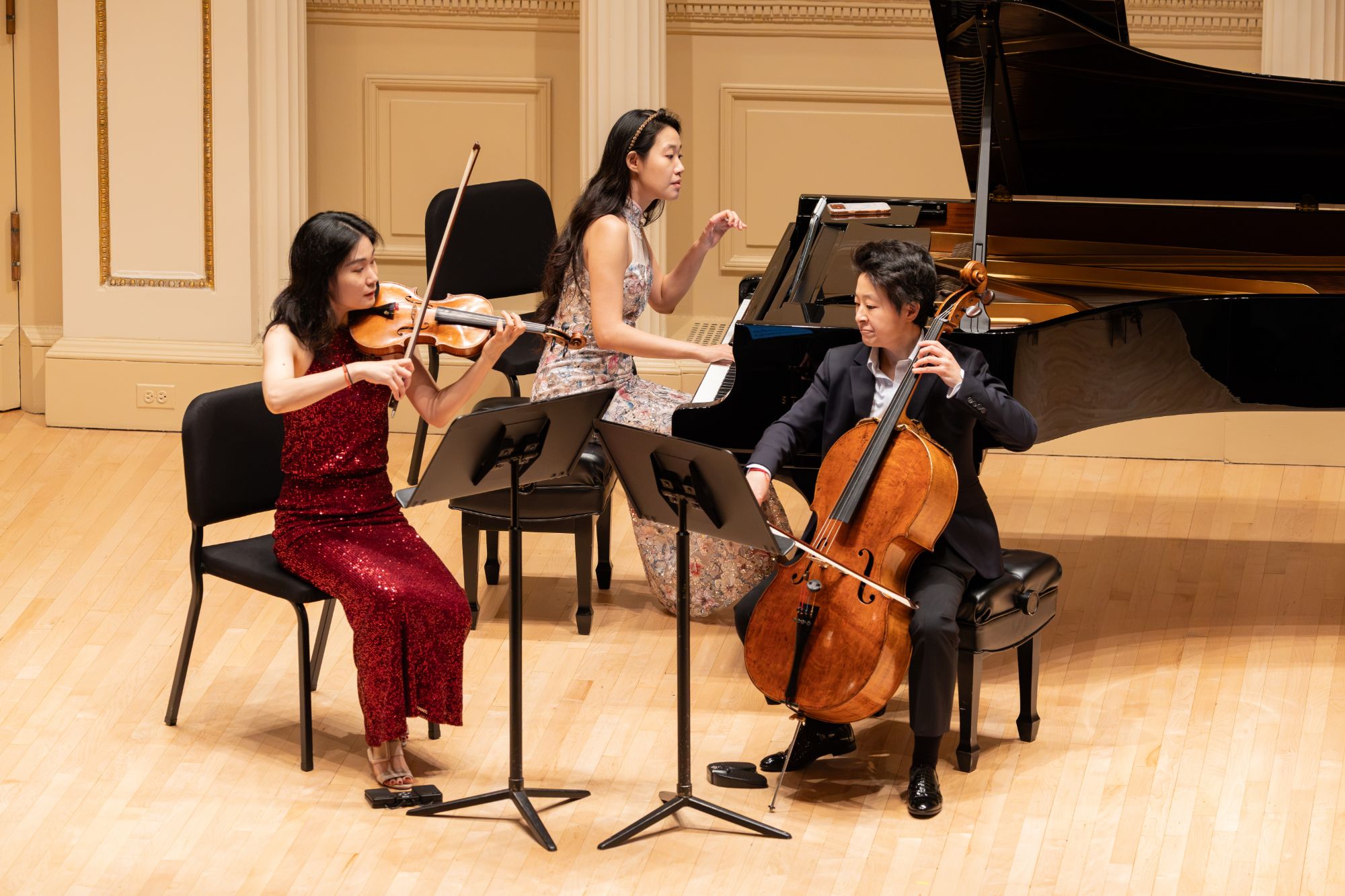 The piano trio seen from above, mid-performance
